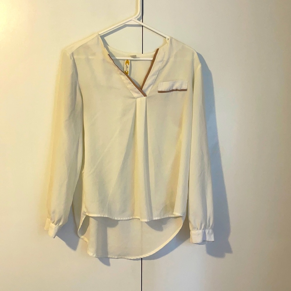 Women’s white long sleeve blouse with tan detail on chest and back